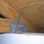 Attic roof strap connection